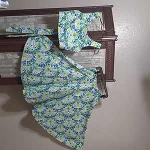 Full circle flowered skirt and middriff top